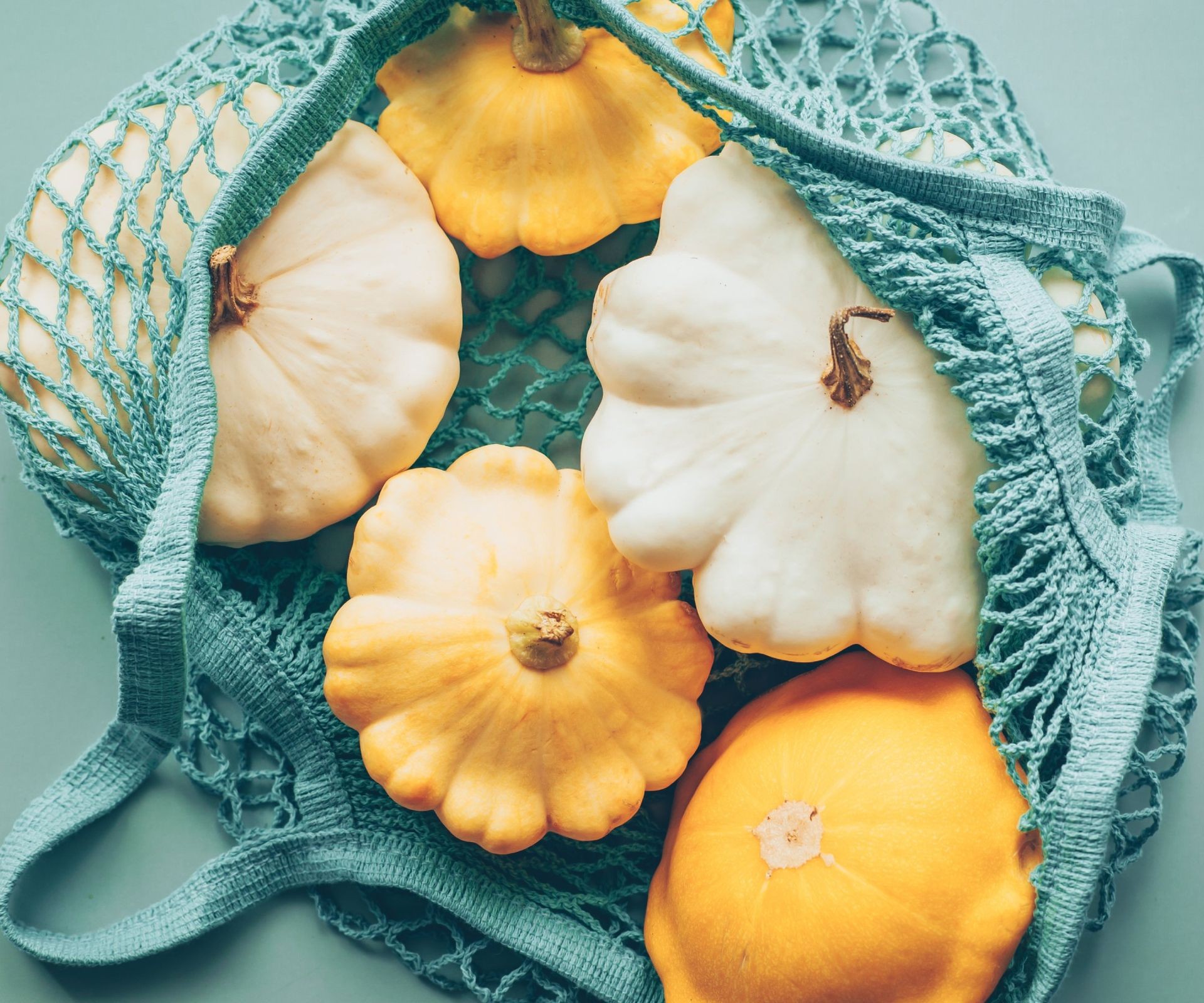 A variety of yellow and white pattypan squash
