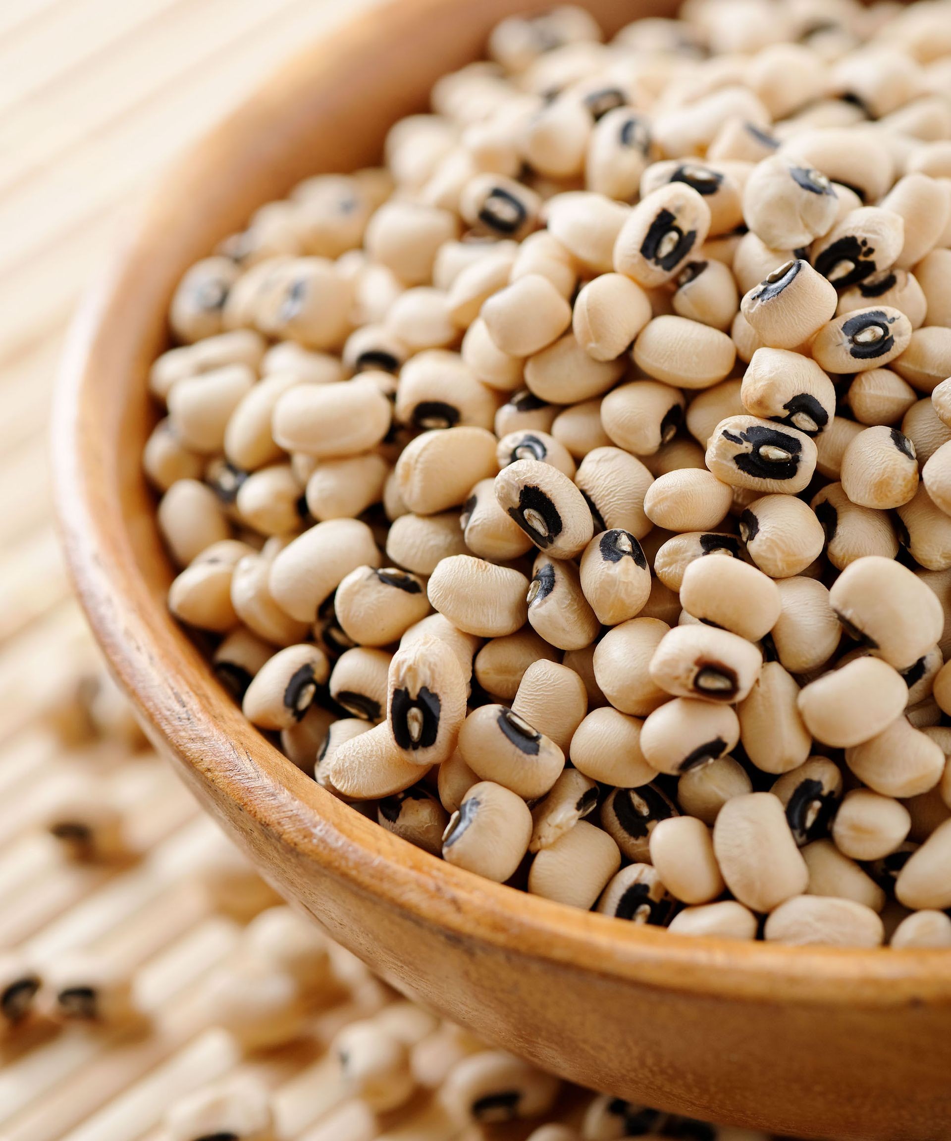 Bowl filled with dried black-eyed peas, a common variety of cowpea