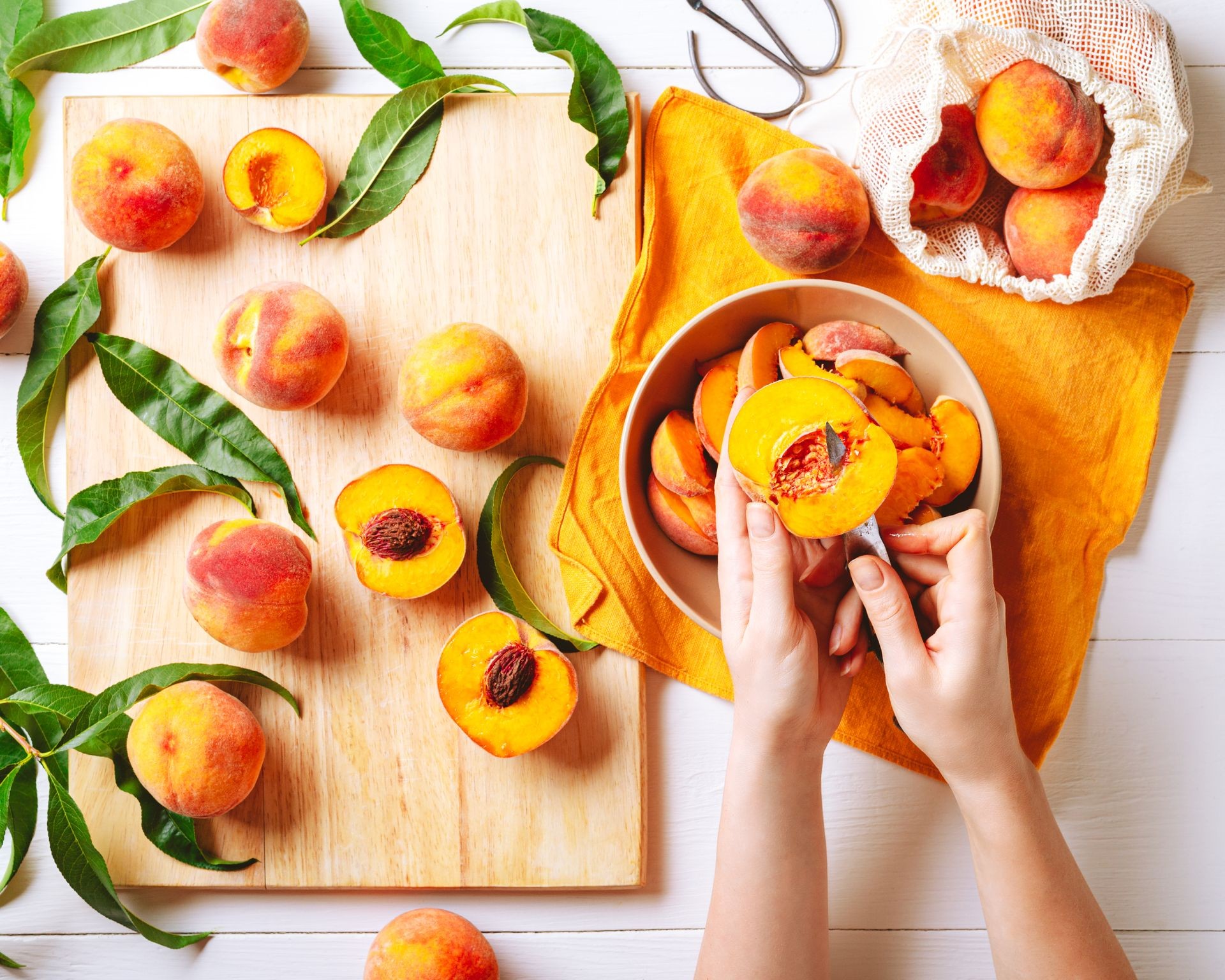 Woman holding a peach